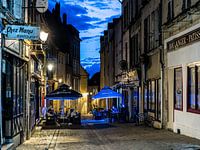 Summer evening cafes terraces French village , blue hour, vintage colours