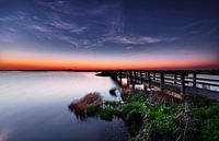 Pont en bois au coucher du soleil