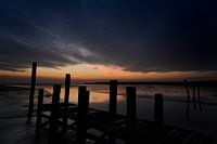 oranje gloed over het wad