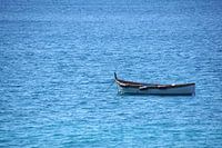 Rowing boat on calm sea