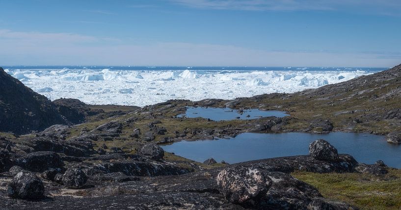 Lakes overlooking the Ilulissat ice fjord in Greenland. by Ralph Rozema