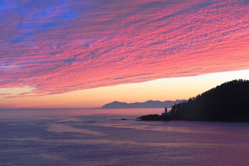 Evening sky above lighthouse by Rolan ter Schegget