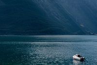 White boat among norwegian fjords