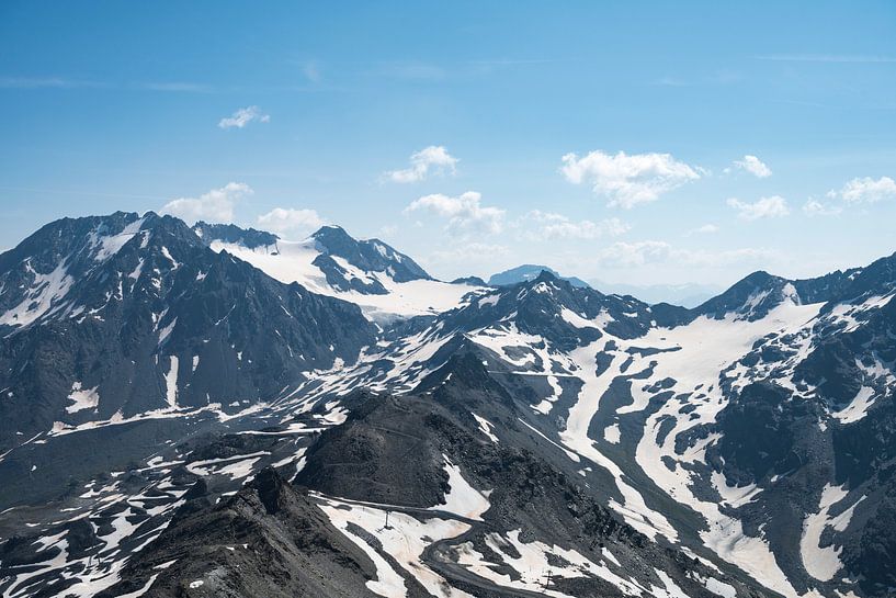 Snowy mountain tops in Les Trois Vallees, France by Christa Stroo photography