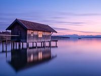 The small boathouse near Stegen at the Ammersee with the Zugspitze in the background