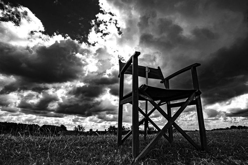 Director's chair black and white. Dutch sky. by Frank Slaghuis