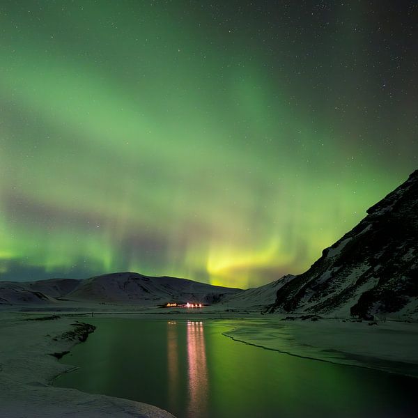 Aurora Borealis over the mountains by Frits Hendriks