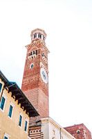 Church tower with buildings in central Verona