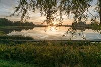 Het Groote Gat bij Oostburg in de opgaande zon
