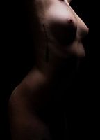 naked girl in the shadow