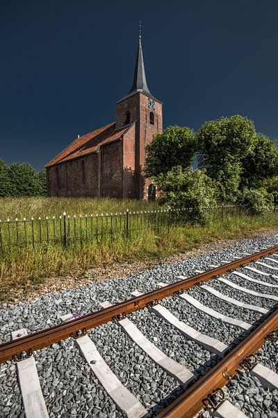 Church in Delfzijl on the tracks to the harbor by Harrie Muis