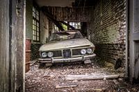 Old car in expired garage