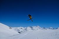 Skier above the mountains
