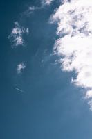 Look up at the blue sky