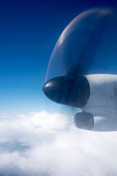 Above the clouds in blue and white by Margot van den Berg