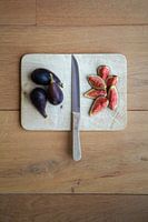 Figs on wood with knife