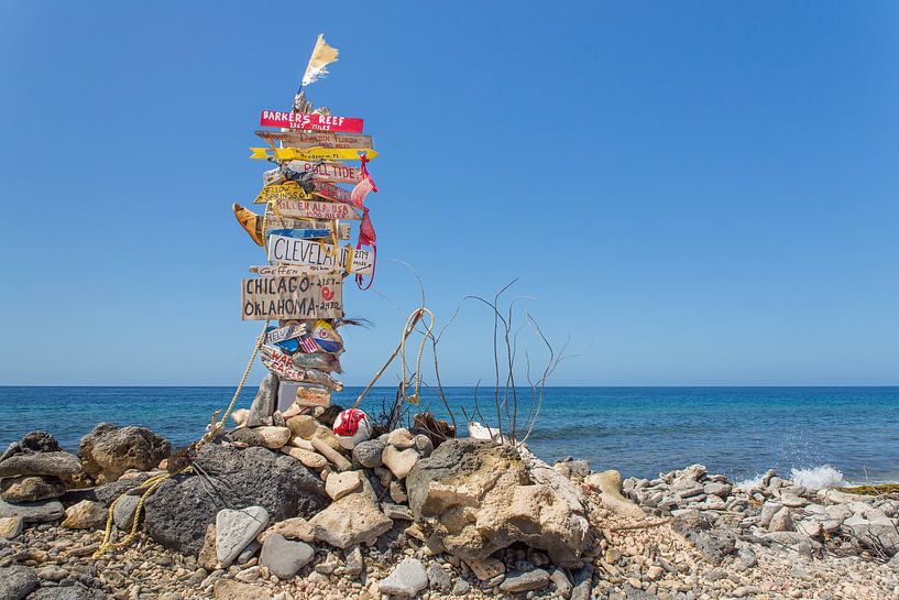 Landscape traffic sign with place names on the coast of Bonaire by Ben Schonewille