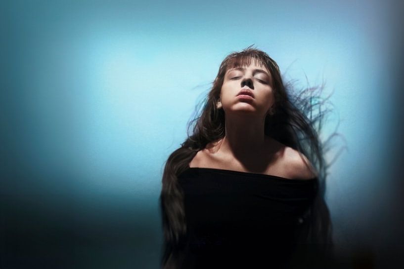 Enchanting Photography: Woman in Serenity Against Cyan Background | Inner Peace and Harmony by Elianne van Turennout