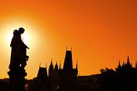Sunset silhouettes of Charles Bridge in Prague
