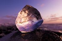 Zonsopkomst door ijsblok