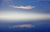 Floating cloud - reflection on still water