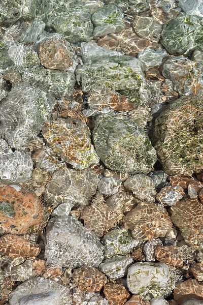 Clear sea water flowing over bright stones 1 by Adriana Mueller