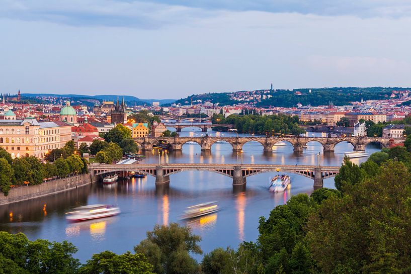 Excursion boats on Vltava River in Prague near dawn by Werner Dieterich