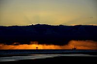 Ameland drilling rigs at sunset