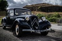 Classic car 1955 Citroen Traction Avant 11B, photographed diagonally from the front.