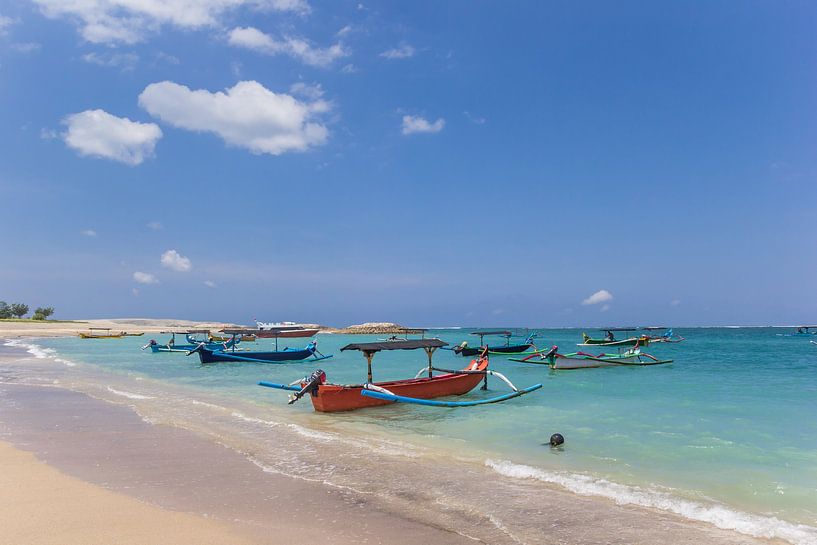 Fishing boats at the beach of Kuta on Bali by Marc Venema