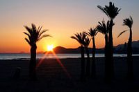 Ondergaande zon strand Benidorm