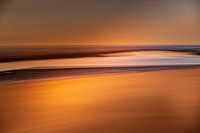 Gouden kleuren van zee en zon.