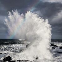 Storm with rainbow in northern Iceland