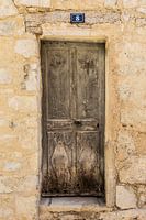 Light brown door number 8 in Buis-les Baronnie in France