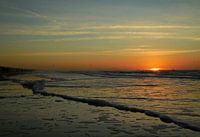 Zonsondergang bij zee