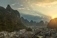 Sunset over the karst mountains at yangshuo city (china )