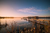 Zonsopkomst aan het water