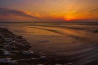 De zon gaat onder na een schitterende dag