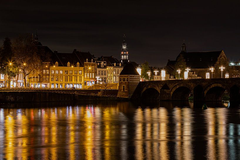 Maastricht skyline during the evening with a view of the saint servaas bridge and the old Stokstraat by Kim Willems