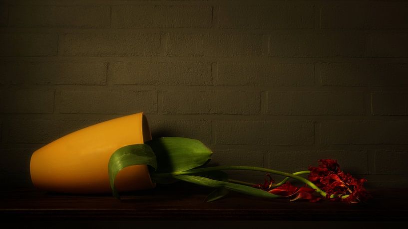 Still life fallen vase with flowers by Johannes Schotanus