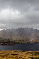 Landscape with rain in the distance.
