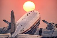 Douglas C-47A Skytrain during sunset at Schiphol East
