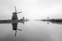 Windmills in the fog