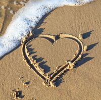 Heart painted in the beach sand at the Baltic Sea