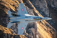 Swiss F-18 flies through the Alps