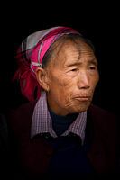 Portrait of a Chinese woman in Dali on a black background