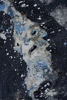 Expression of old paint layers on concrete base