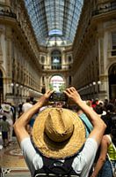 Tourist in the oldest shopping center in Italy