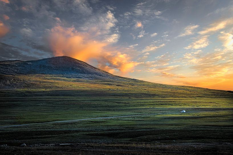 A big mountain and a small camping trailer. by Karl Andrén