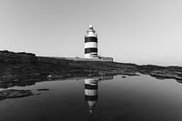 Réflexion sur le rivage rocheux, phare de Hook Head
